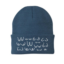 Load image into Gallery viewer, Denim blue beanie with white pattern on a white background