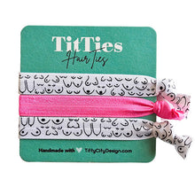 Load image into Gallery viewer, Set of 3 hair tie bracelets with bright pink hair tie in the middle on a teal card