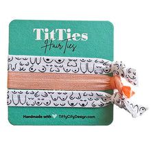 Load image into Gallery viewer, Set of 3 hair tie bracelets with peach hair tie in the middle on a teal card