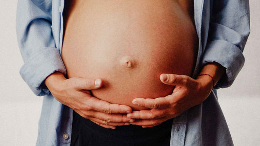 pregnant belly of woman preparing for baby to arrive