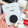 Photo of Titty City Black Pop Socket PopGrip in packaging 