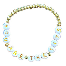 Load image into Gallery viewer, Gold beaded friendship bracelet with motivational message on beads against a white background
