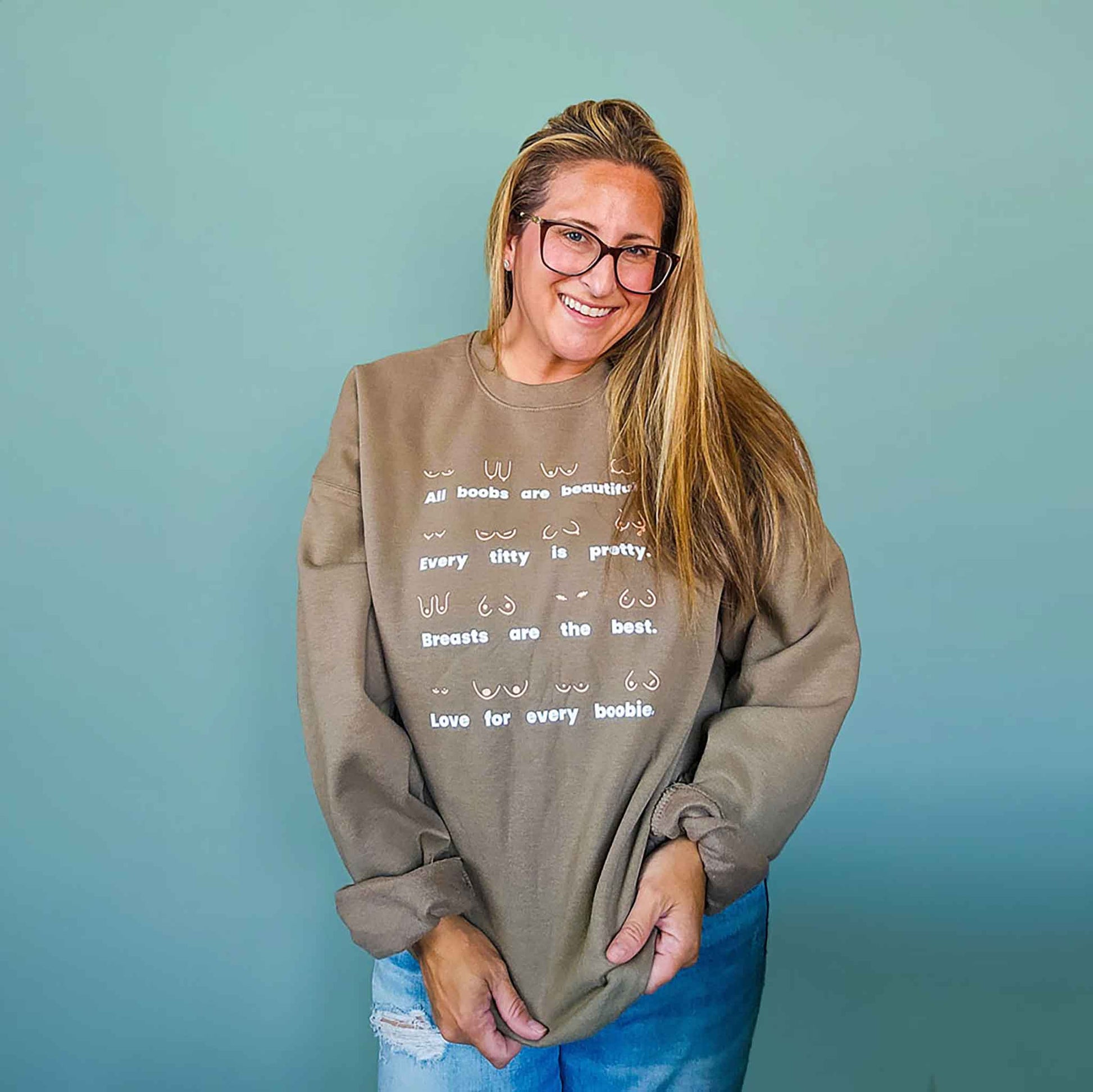Model wearing the Body Positivity crew sweatshirt in coffee brown, front view full