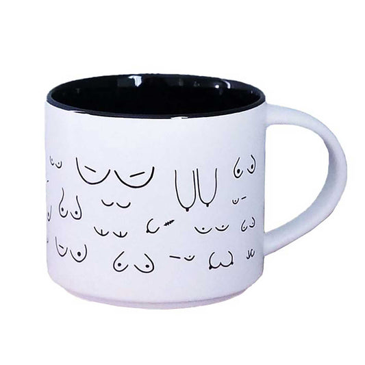 White mug with black interior and decorative black patterns on a white background