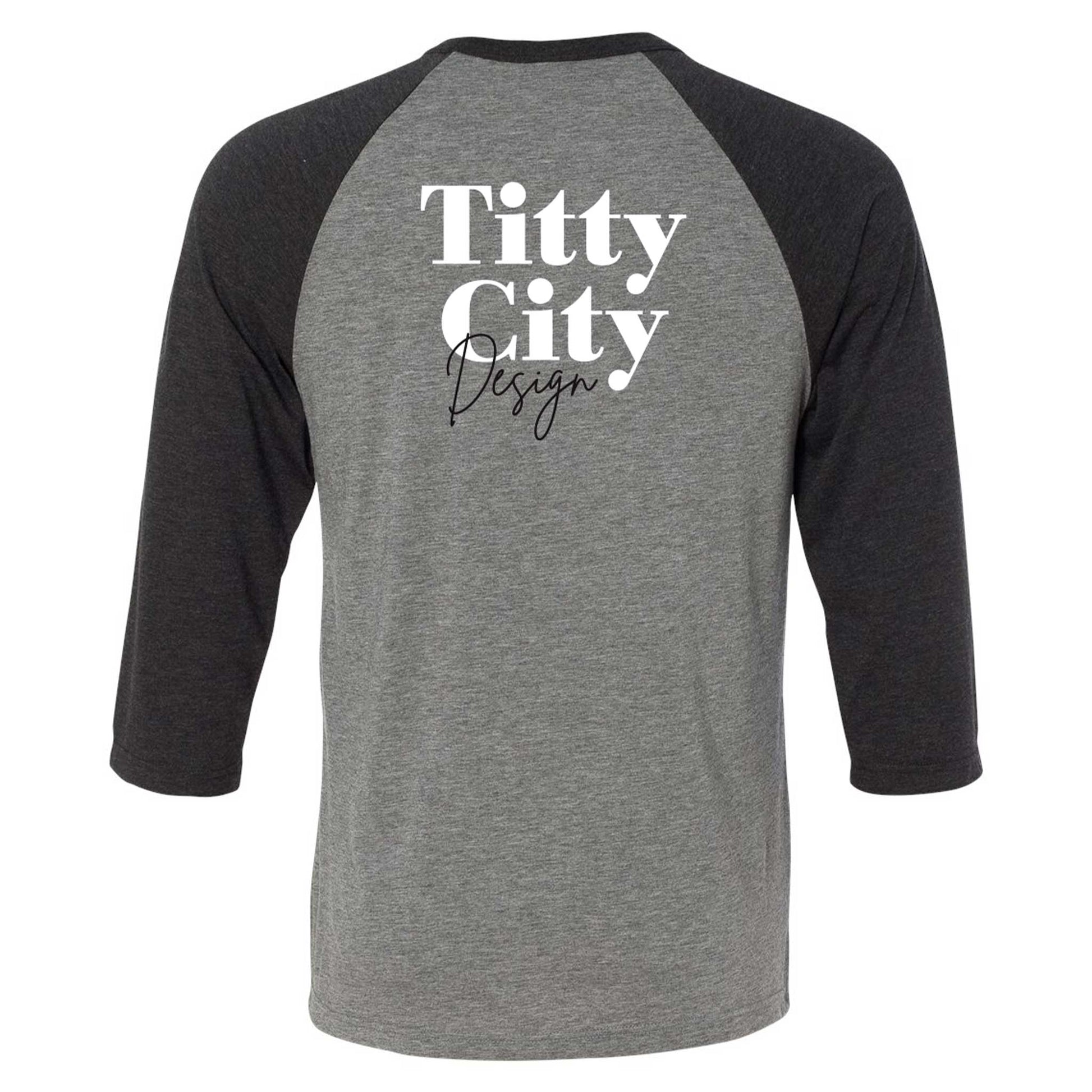 Breast Coast baseball t-shirt with gray body and black sleeves with logo centered on the upper back, back view