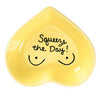 Hand-painted, ceramic heart-shaped dish with fun message in butter yellow