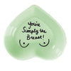 and-painted heart-shaped ceramic jewelry dish with fun phrase in green