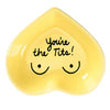 Hand-painted heart-shaped ceramic jewelry dish with playful message in butter yellow