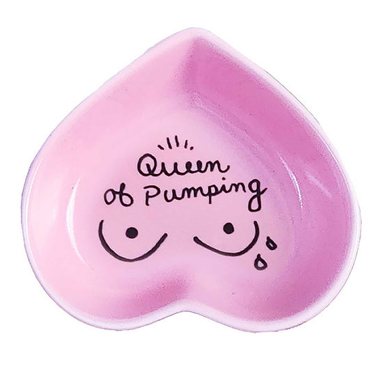 Hand-painted heart-shaped ceramic dish with motherhood and feeding message in pink