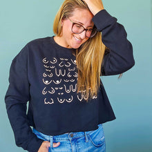 Load image into Gallery viewer, model wearing the Self Love cropped sweatshirt in black, front view
