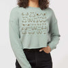 model wearing the Self Love cropped sweatshirt in ocean, front view