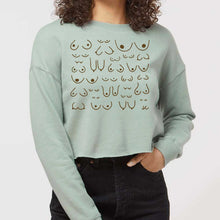 Load image into Gallery viewer, model wearing the Self Love cropped sweatshirt in ocean, front view
