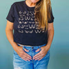 model wearing the self love club cropped tee in black, front view, close up