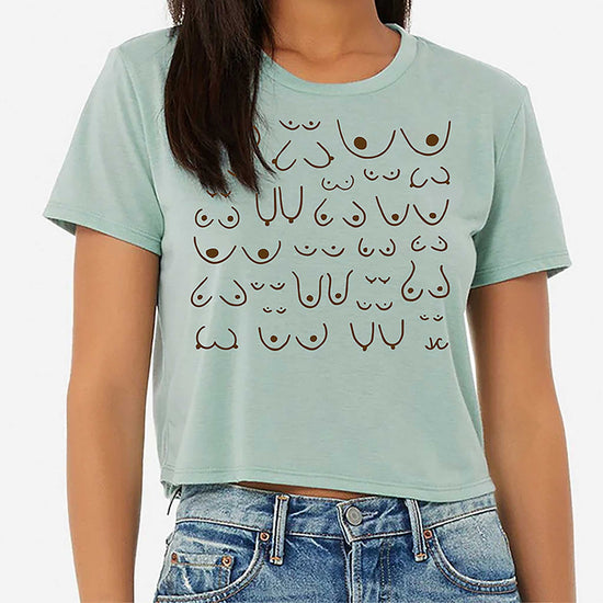 model wearing of the self love club cropped tee in ocean, front view