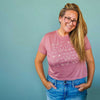 model wearing the self love club cropped tee in rose pink, front view
