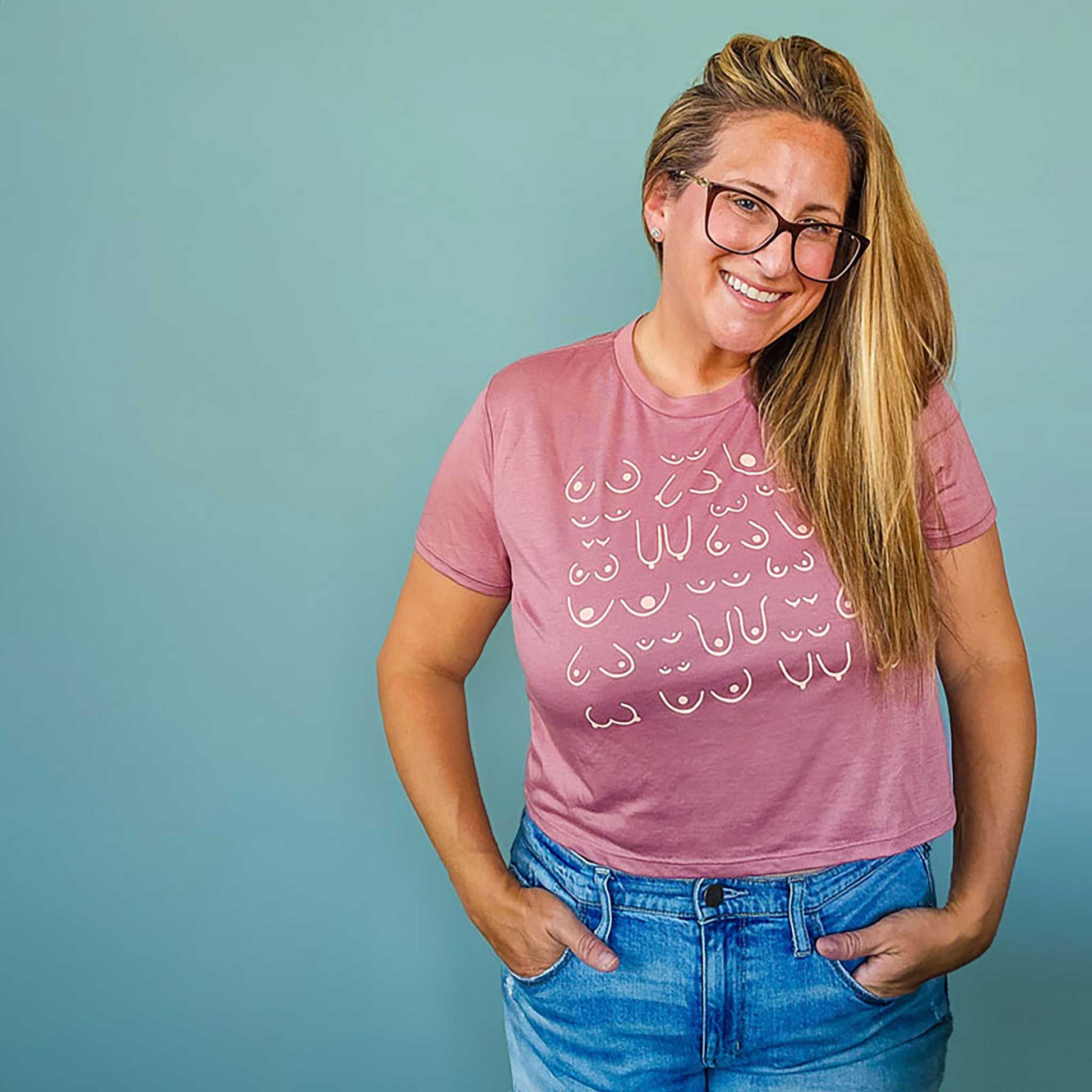 model wearing the self love club cropped tee in rose pink, front view