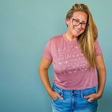 Load image into Gallery viewer, model wearing the self love club cropped tee in rose pink, front view
