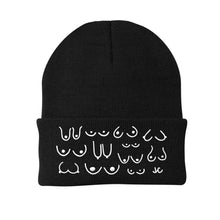 Load image into Gallery viewer, Black beanie with white patterns on a white background

