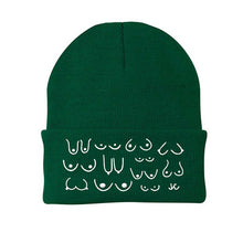 Load image into Gallery viewer, Forest green beanie with white pattern on a white background
