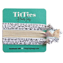 Load image into Gallery viewer, Set of 3 hair tie bracelets with gold hair tie in the middle on a teal card 
