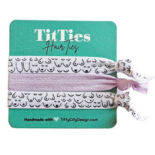 Load image into Gallery viewer, Set of 3 hair tie bracelets with lilac purple hair tie in the middle on a teal card 
