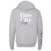 Titty City brand zip-up hooded sweatshirt in gray with logo on center back and slogan on right sleeve, back view