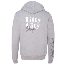 Load image into Gallery viewer, Titty City brand zip-up hooded sweatshirt in gray with logo on center back and slogan on right sleeve, back view
