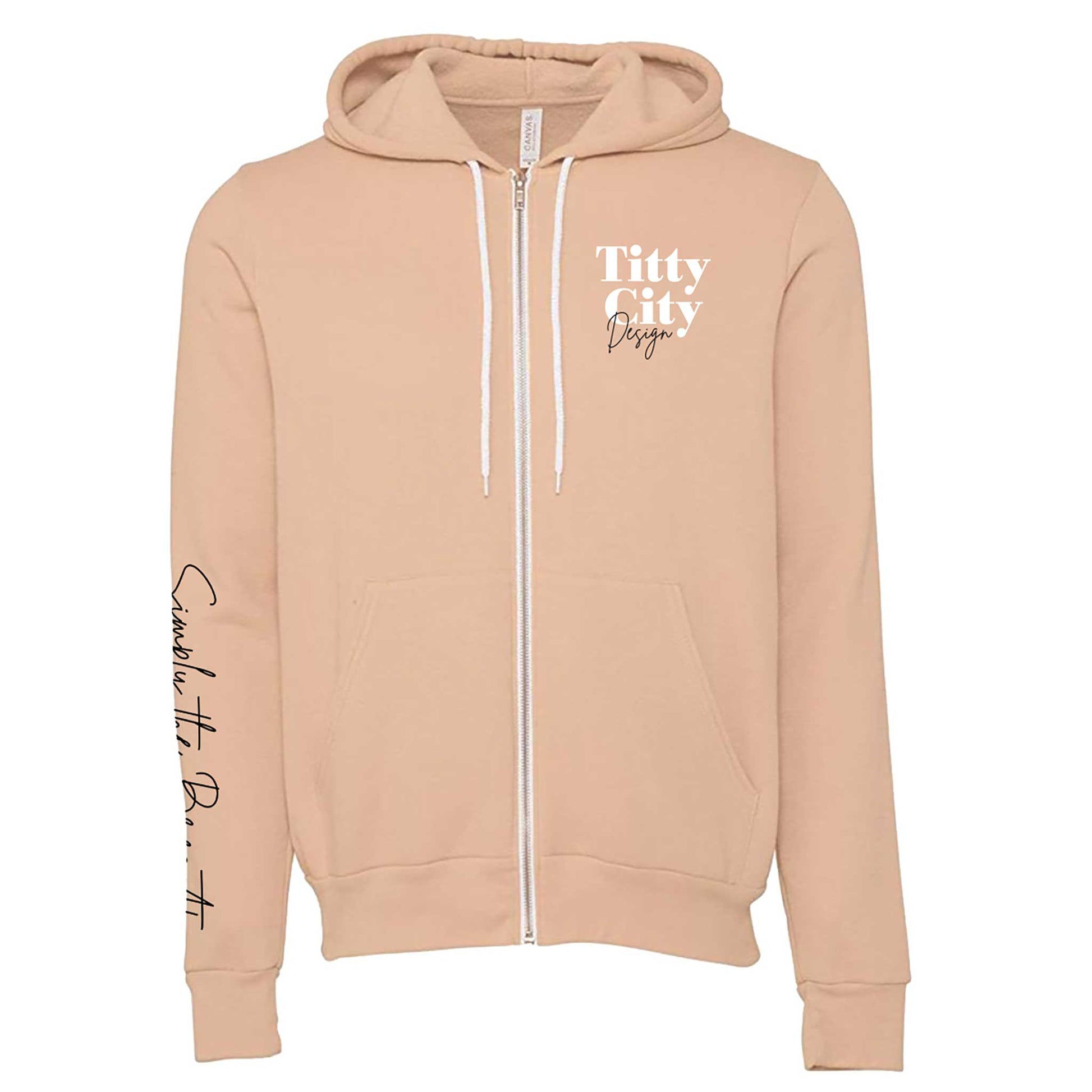 Titty City brand zip-up hooded sweatshirt in peach with logo on left chest and slogan on right sleeve, front view