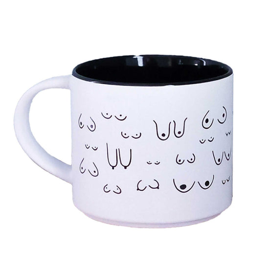 White mug with black interior and decorative black patterns on a white background