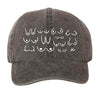 Vintage washed black cotton dad hat with white design on a white background