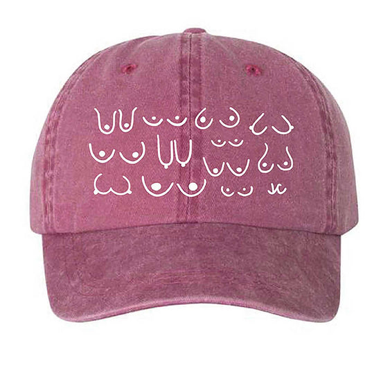 Rose pink cotton dad hat with white embroidered design on a white background