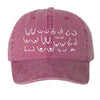 Rose pink cotton dad hat with white embroidered design on a white background